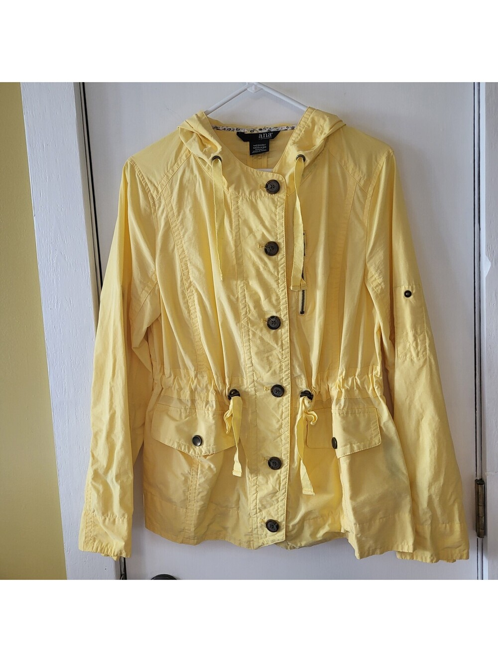 yellow A.N.A. A New Approach jacket features  drawstring waist and hooded design